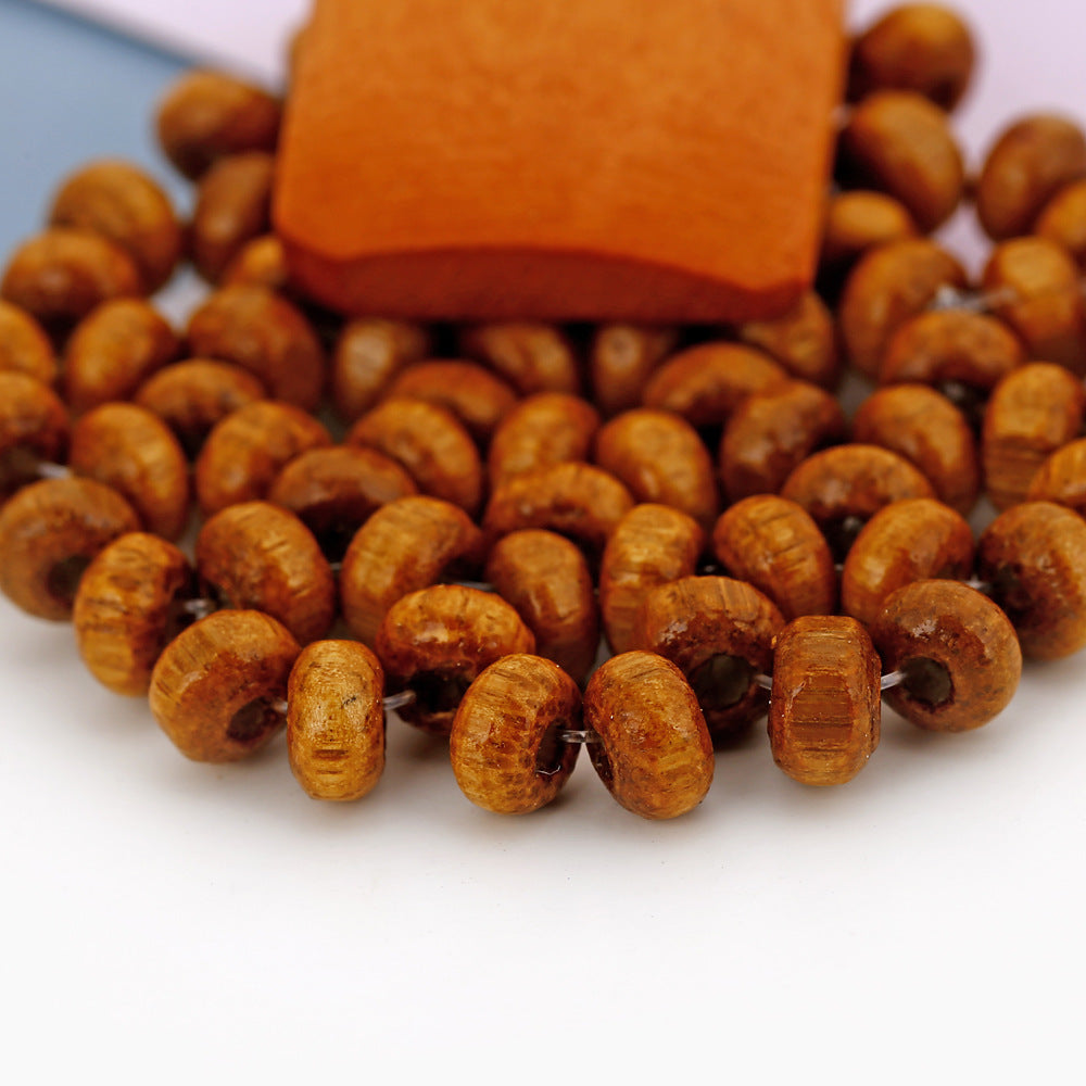 Pendientes Artesanales con Cuentas de Madera – Estilo Natural y Bohemio