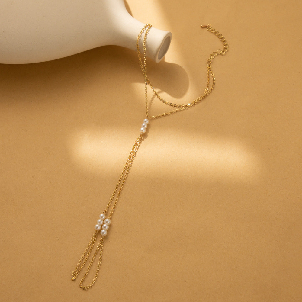 Pulsera Esclava con Perlas – Diseño Elegante y Envolvente