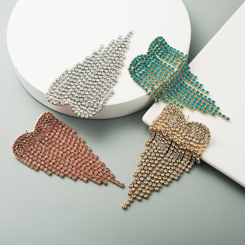 Pendientes Largos con Cristales en Forma de Ala – Brillo Elegante y Estilo Glam