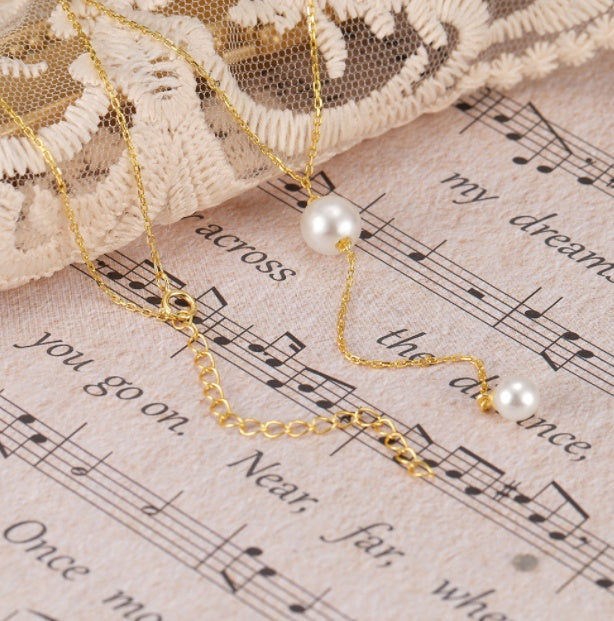 Collar Largo con Perlas Naturales – Diseño Dorado Minimalista y Elegante