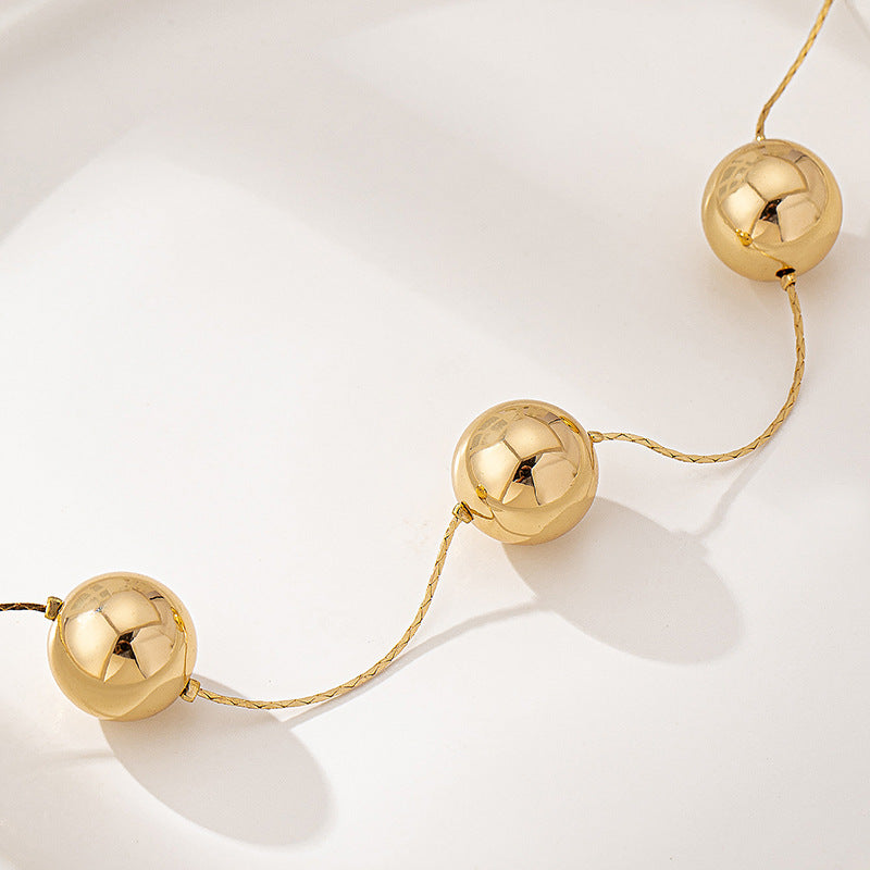 Collar Esferas Doradas Grandes | Diseño Minimalista Impactante