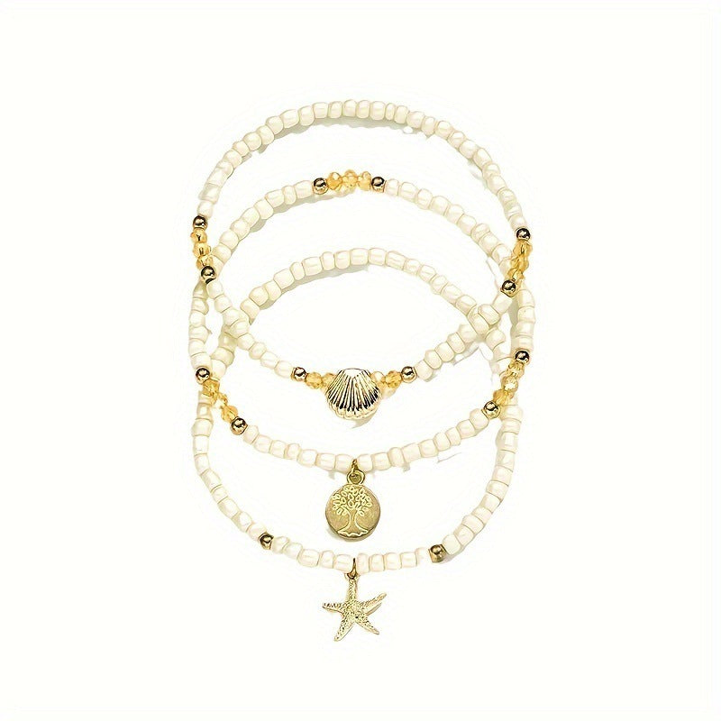 Tobillera de Cuentas Blancas con Conchas Doradas y Estrella Marin