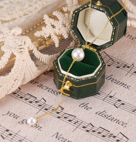 Collar Largo con Perlas Naturales – Diseño Dorado Minimalista y Elegante